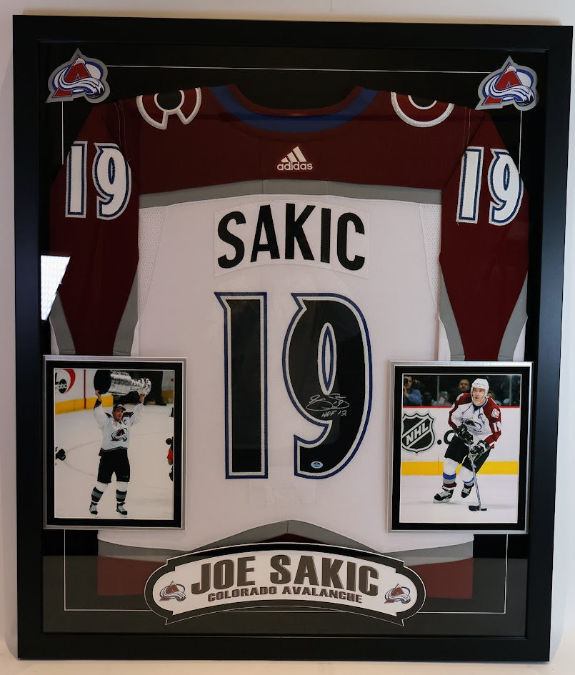 Joe Sakic Autographed Colorado Avalanche White Jersey with "HOF 12" Inscription - Latitude Sports Hologram