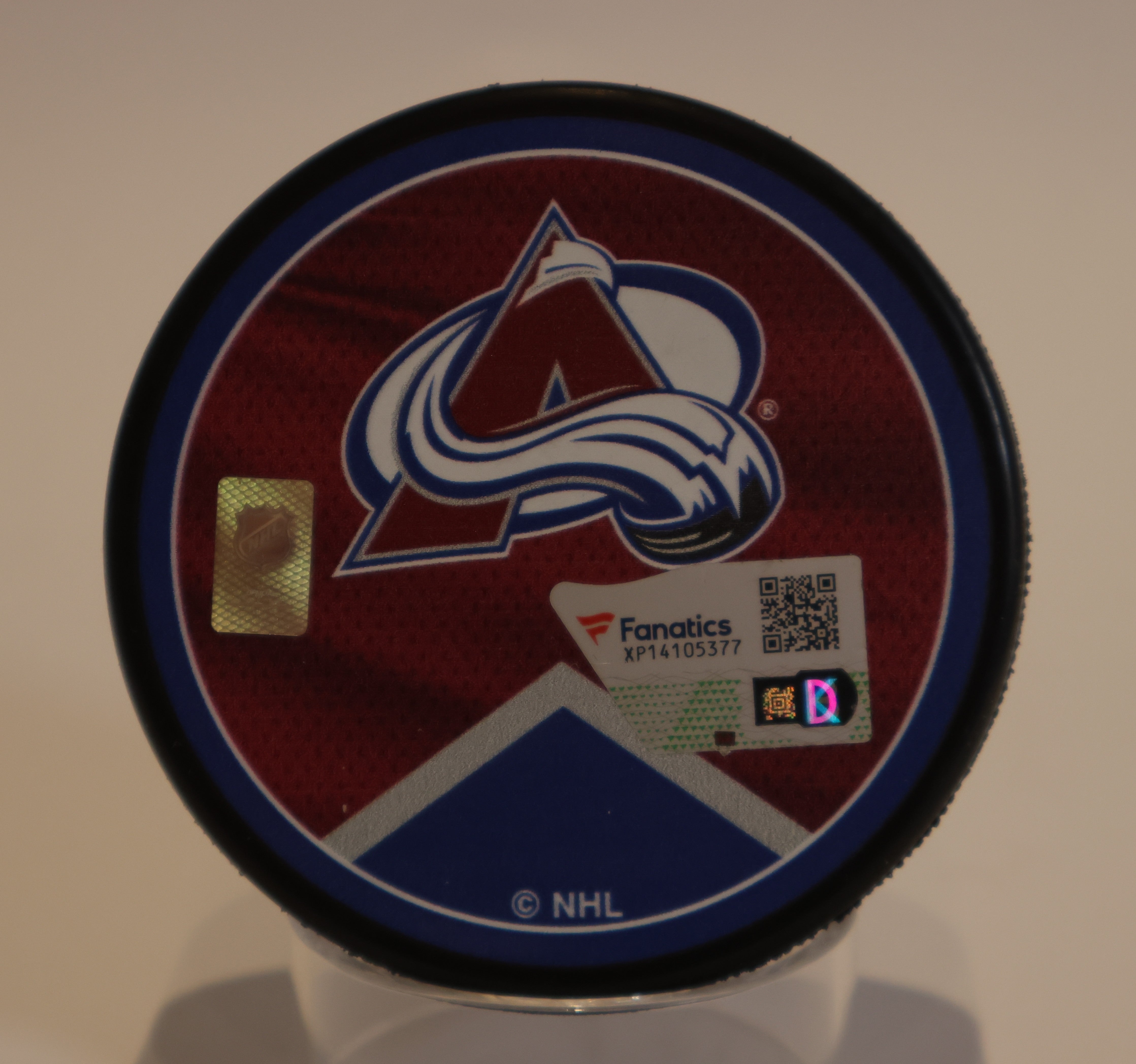 Cale Makar Autographed Puck - Colorado Flag Jersey/Burgandy Av's