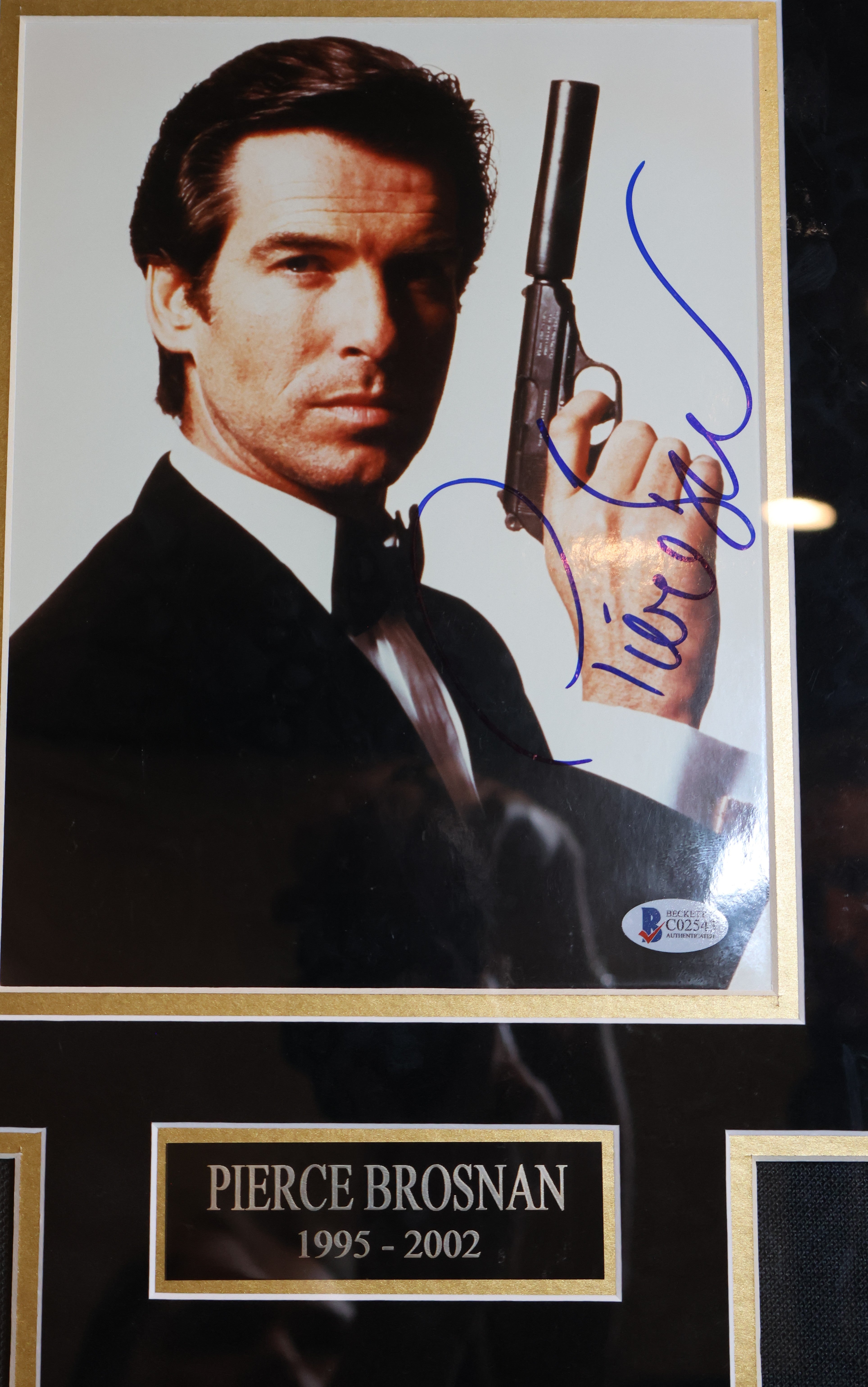 James Bond 007 Collage Autographed by S. Connery, R. Moore, P. Brosnan, D. Craig