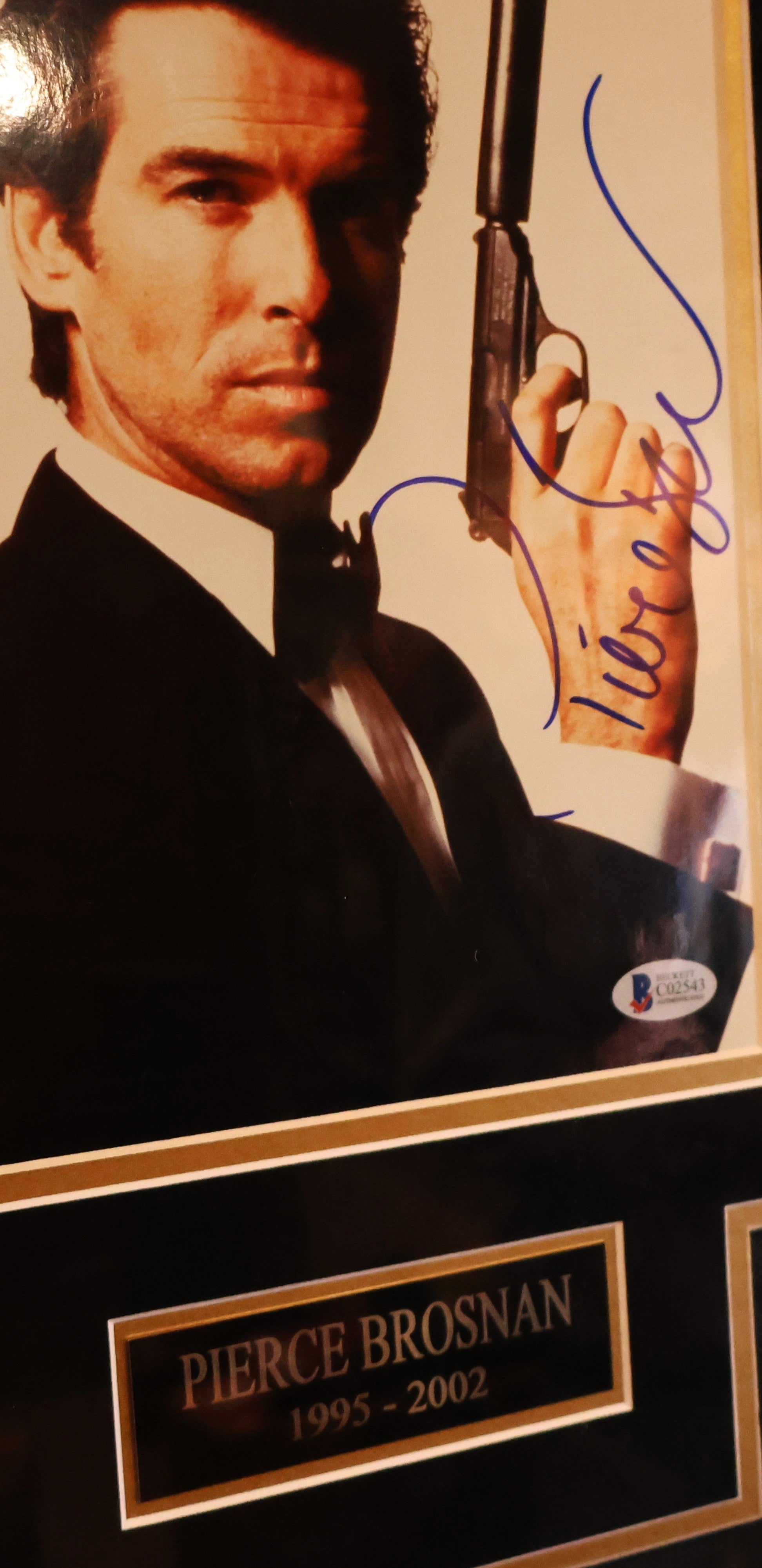James Bond 007 Collage Autographed by S. Connery, R. Moore, P. Brosnan, D. Craig