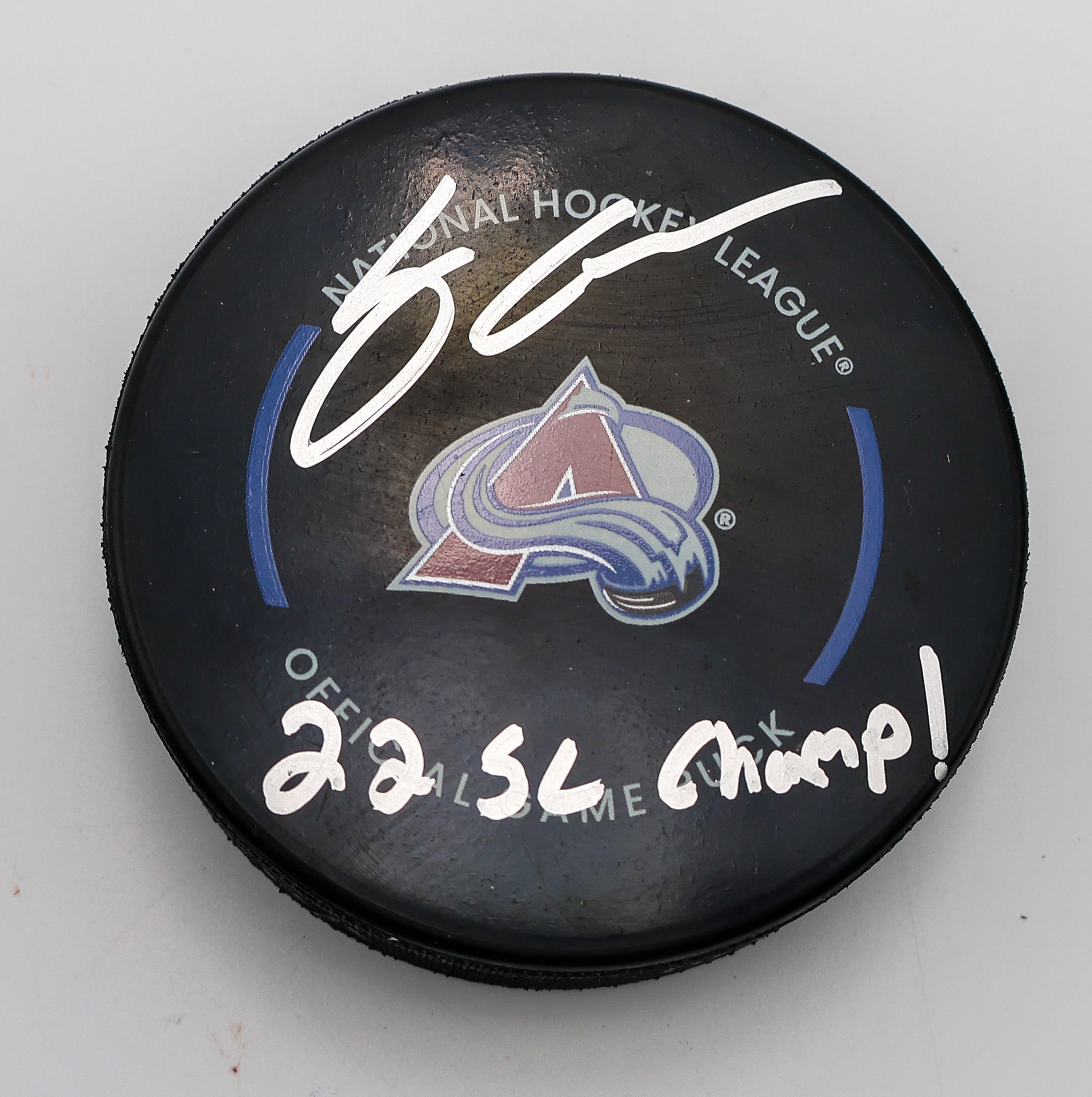Logan O'Connor Autographed Colorado Avalanche Hockey Puck Inscribed "22 SC Champ!"