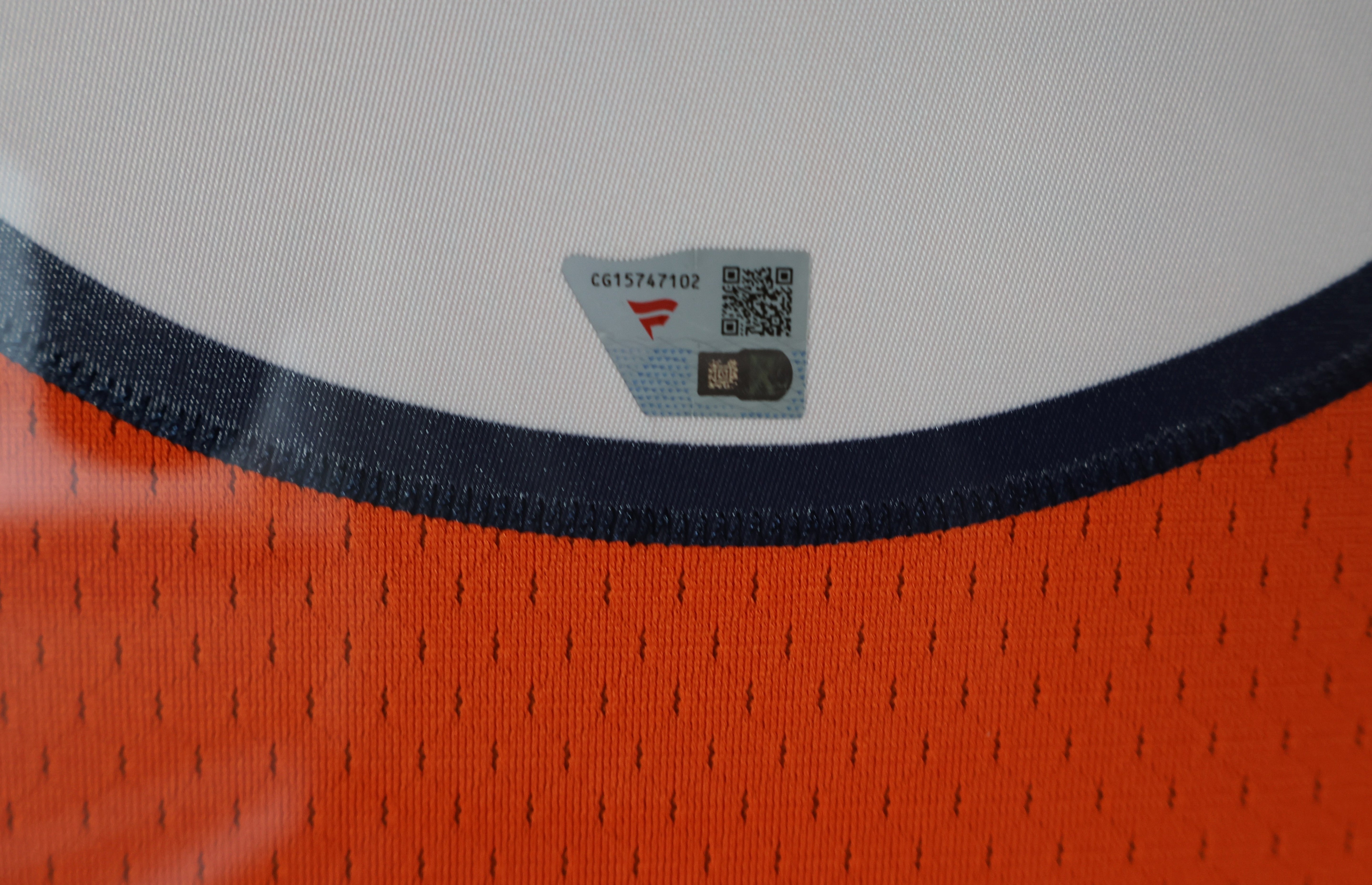 Peyton Manning Autographed Denver Broncos Jersey - Inscribed 'SB 50 Champs' with 8x10 Photos
