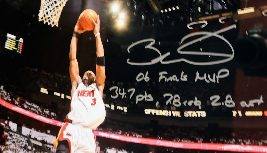 Dwayne Wade Autographed Action Shot With "06 Finals MVP", "34.7PTS", "7.8 reb", and "2.8 ast" inscriptions  LE #1-25 - Fantatics
