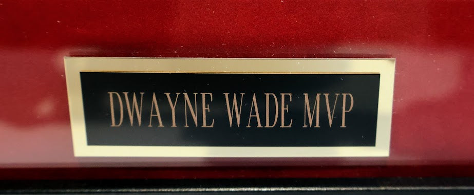 Dwayne Wade Autographed Action Shot With "06 Finals MVP", "34.7PTS", "7.8 reb", and "2.8 ast" inscriptions  LE #1-25 - Fantatics
