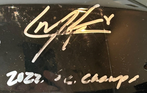 Cale Makar Autographed/Inscribed "2022 SC Champs" Fanatics COA *AS-IS" (smudged)