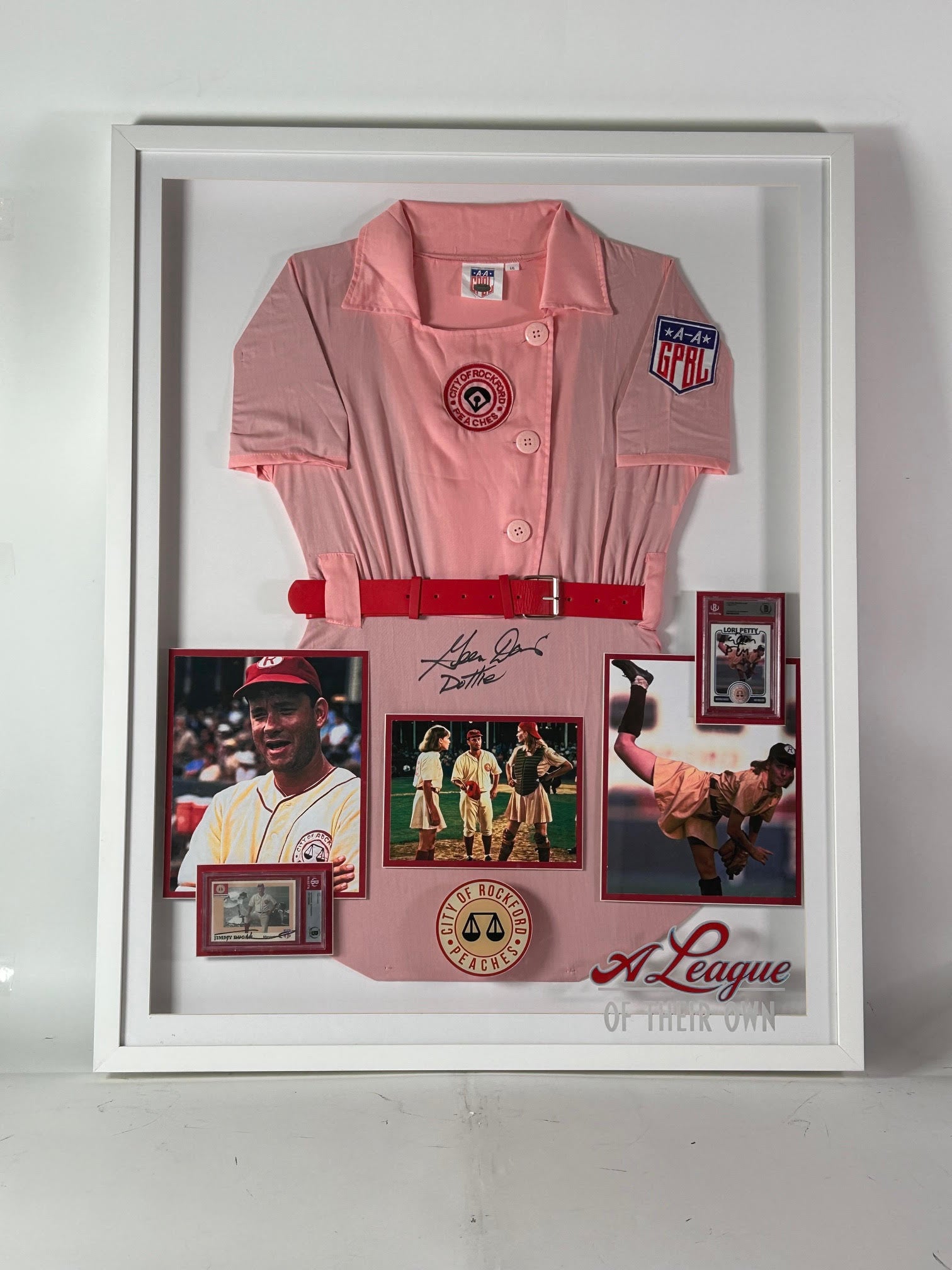 A League of Their Own Framed Triple Autographed Uniform Photo Collage - Tom Hanks Geena Davis Lori Petty - Schwartz Sports Memorabilia and Beckett