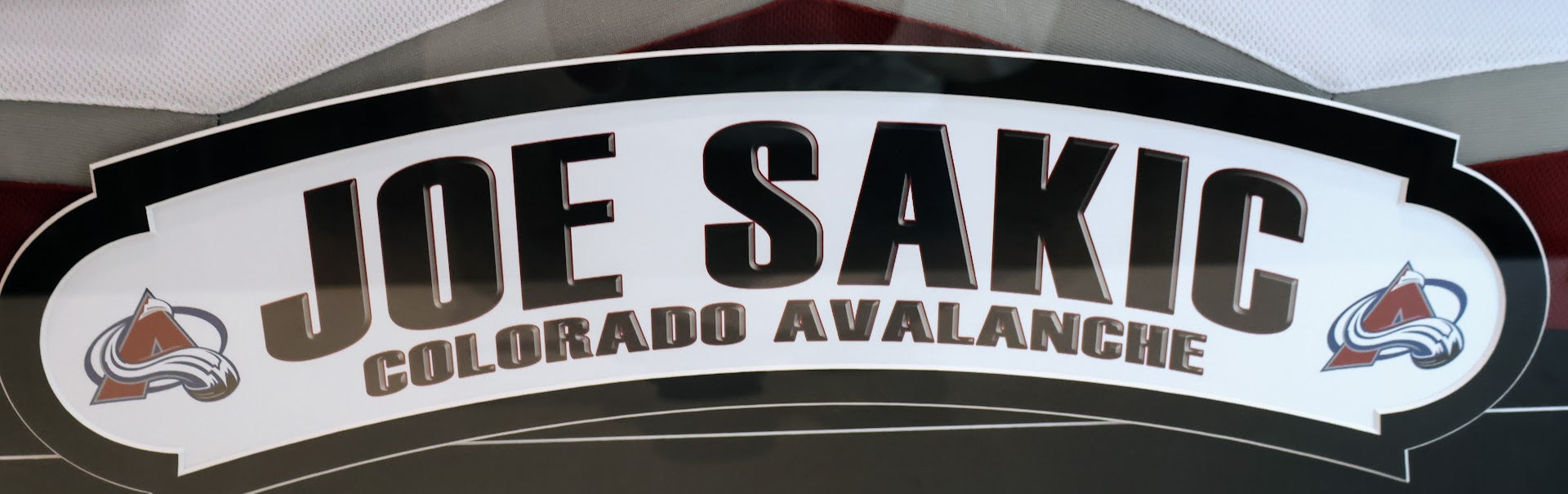 Joe Sakic Autographed Colorado Avalanche White Jersey with "HOF 12" Inscription - Latitude Sports Hologram