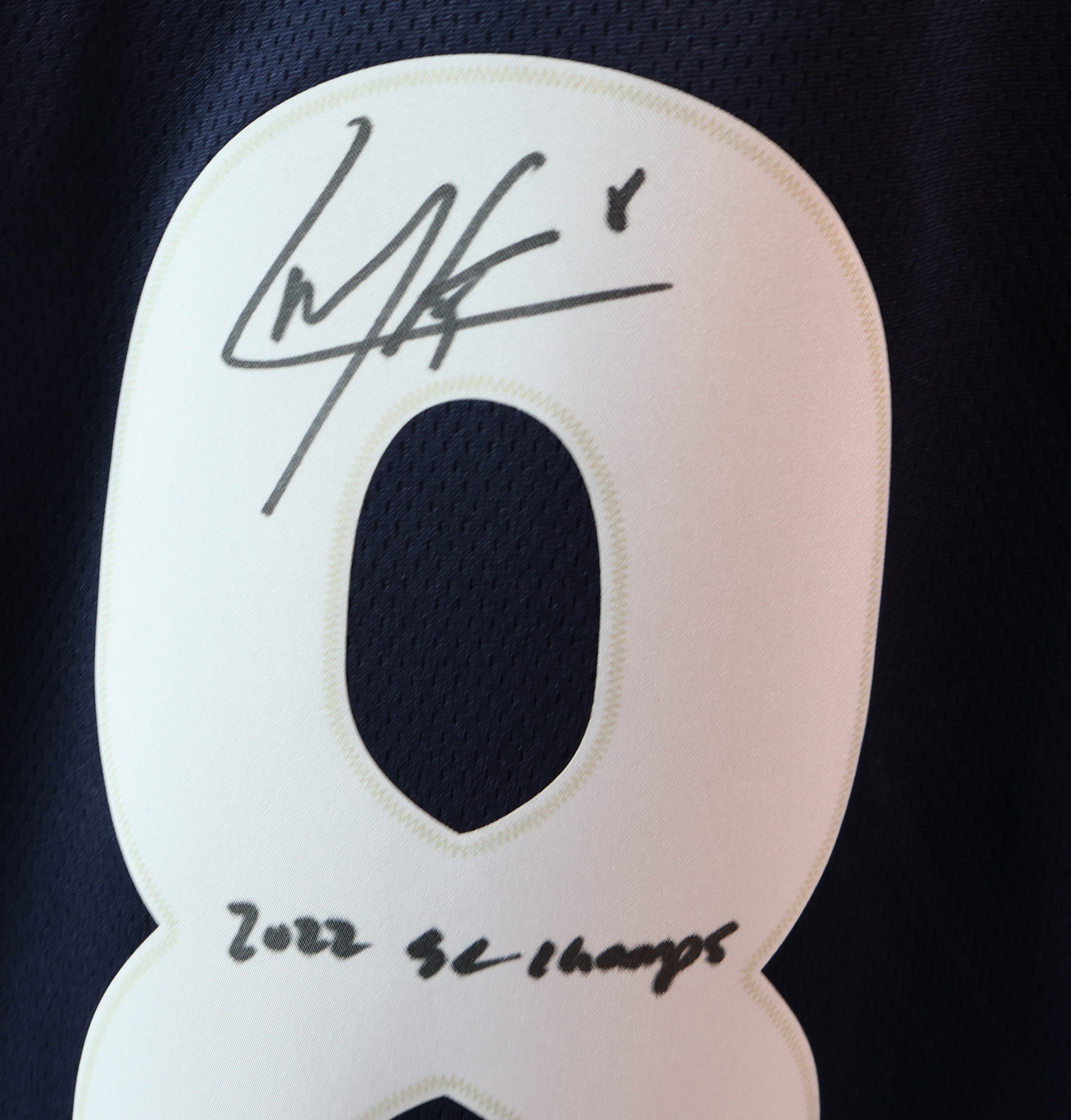 Cale Makar Navy Jersey Autographed w/ inscription "2022 SC Champs"