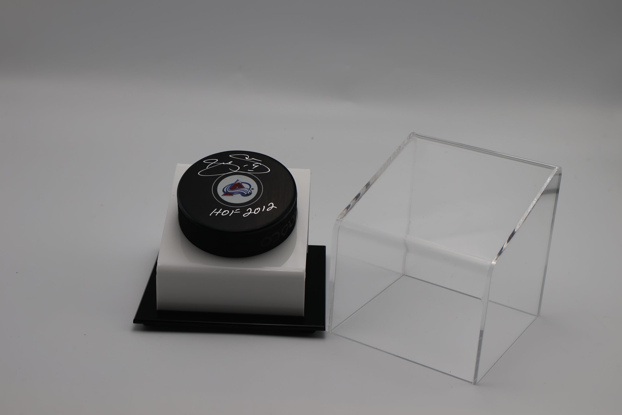 Joe Sakic Autographed Avalanche Puck - JSA COA & Deluxe Display Case Latitude Sports Marketing Joe Sakic Autographed Avalanche Puck - JSA COA & Deluxe Display Case Latitude Sports Marketing