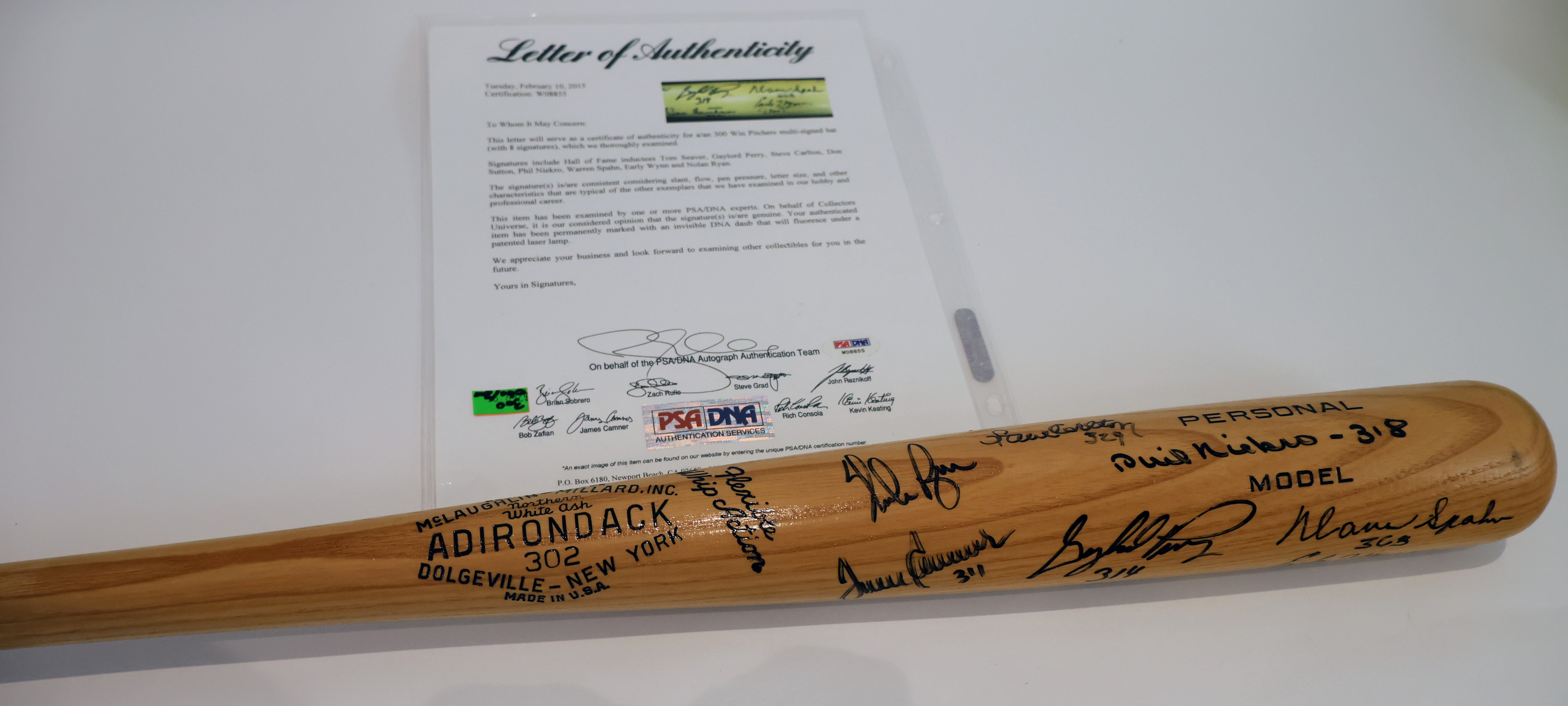 Nolan Ryan, Tom Seaver, Steve Carlton, Phil Niekro, Warren Spahn, Gaylord Perry, Don Sutton, Early Wynn inscribed with career win totals Adirondack bat With PSA/DNA Authentication letter