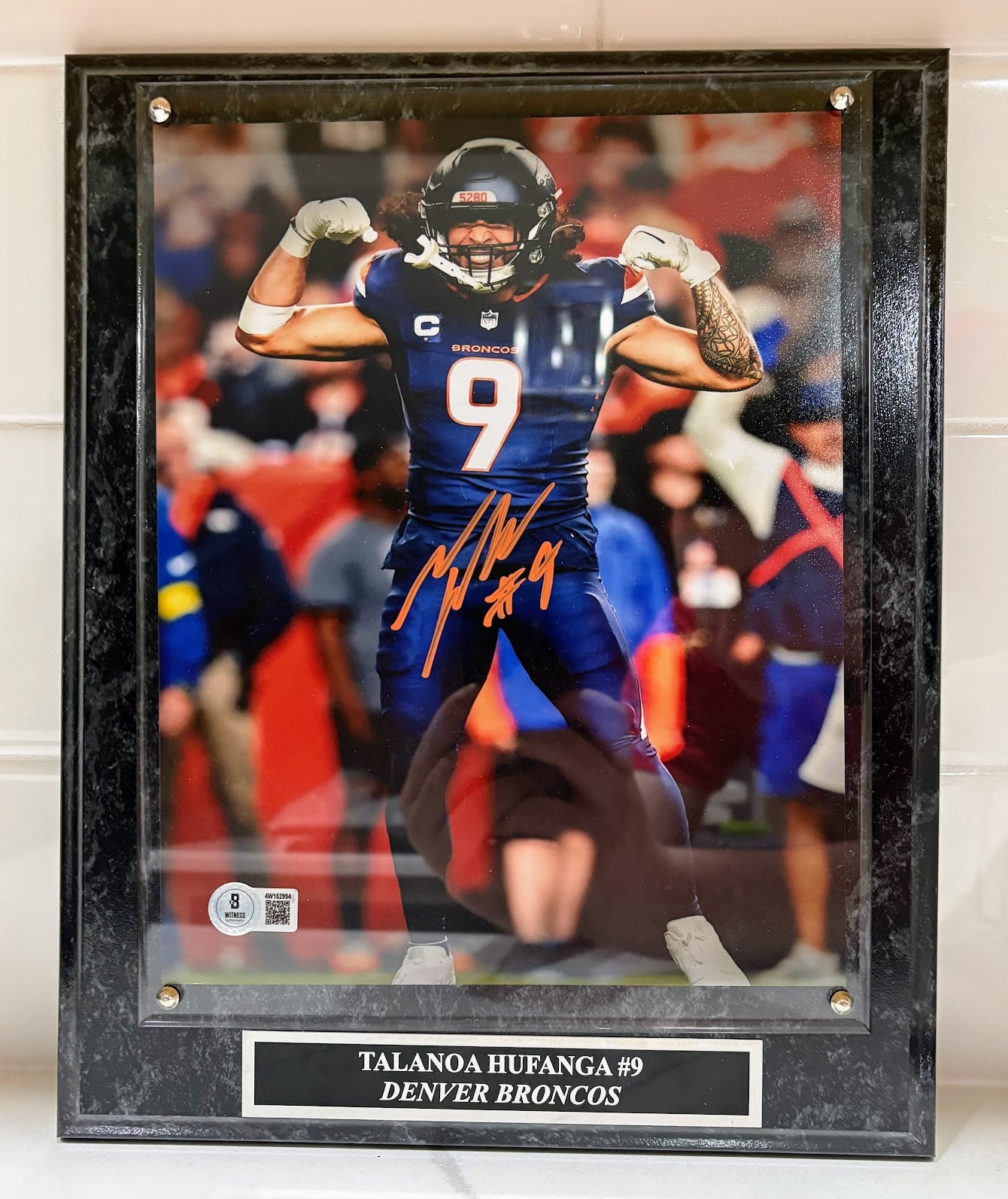 Talanoa Hufanga Autographed 8x10 Flexing Photo with Plaque — Denver Broncos | BAS COA