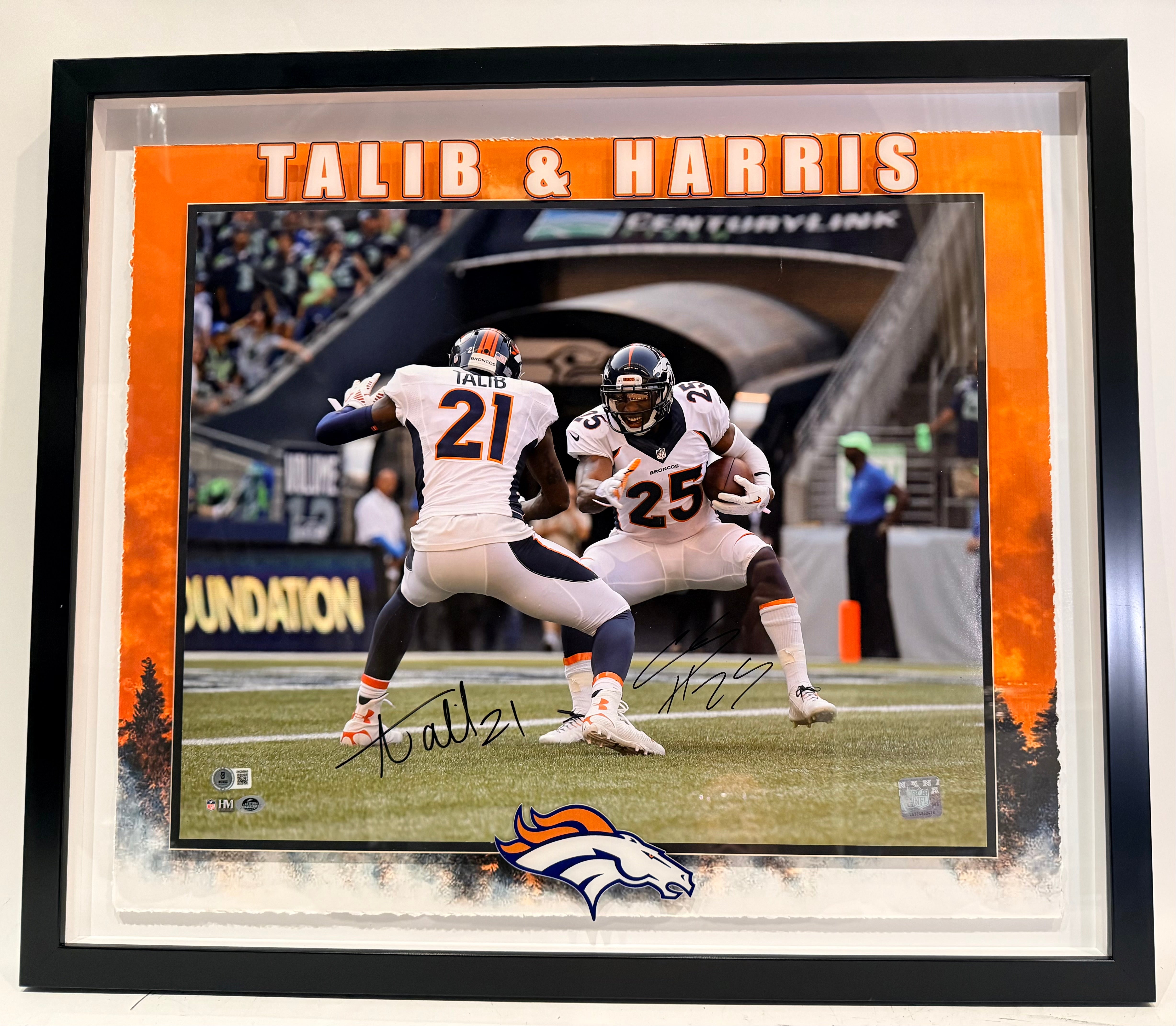 Aqib Talib & Chris Harris Jr. Dual Autographed 16x20 Photo Denver Broncos BAS COA – 23.5" H x 27.5" W Framed