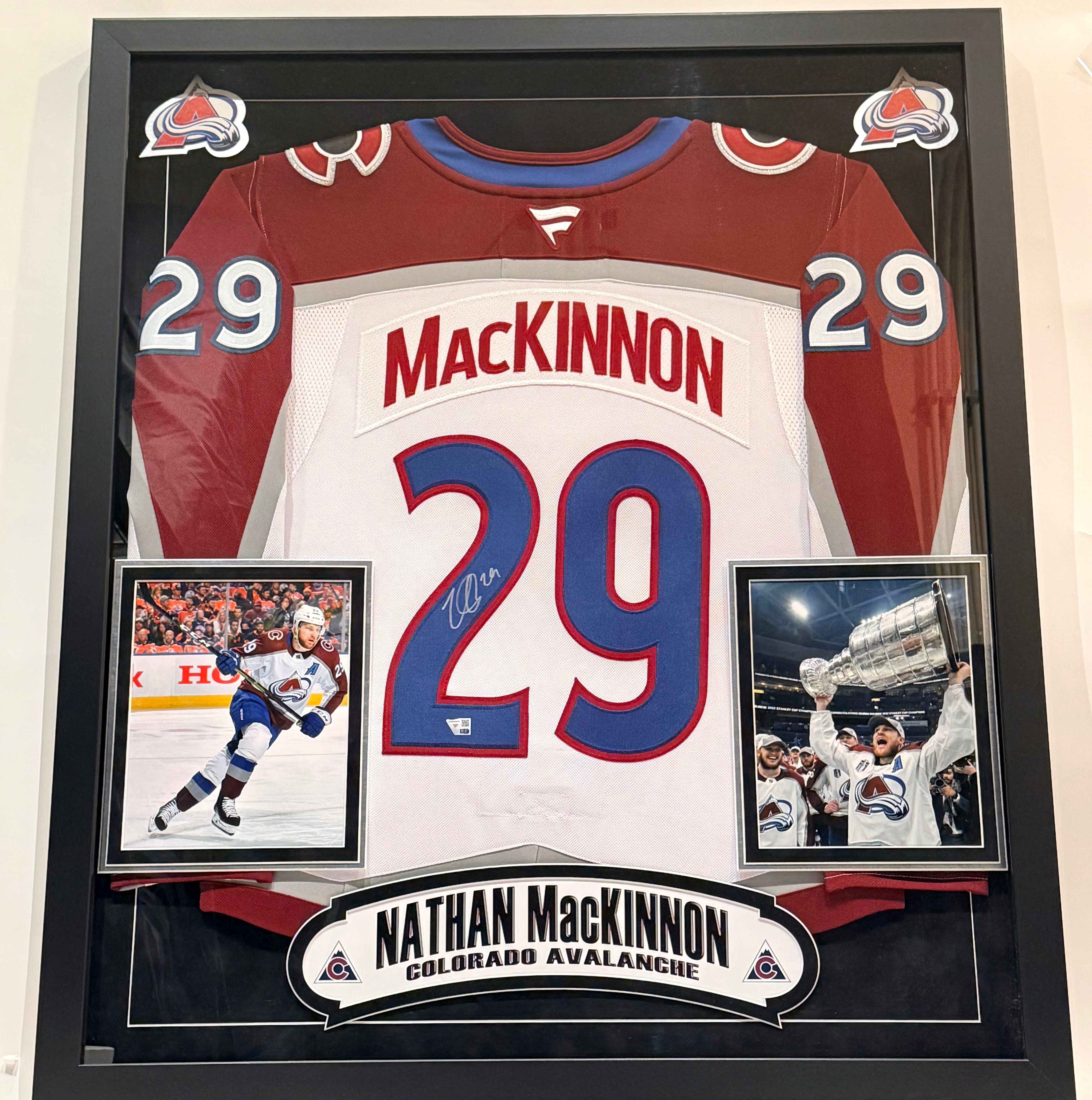 Nathan MacKinnon Autographed White Jersey – Colorado Avalanche | (2) 8x10 Photos & Deluxe Frame | Fanatics COA