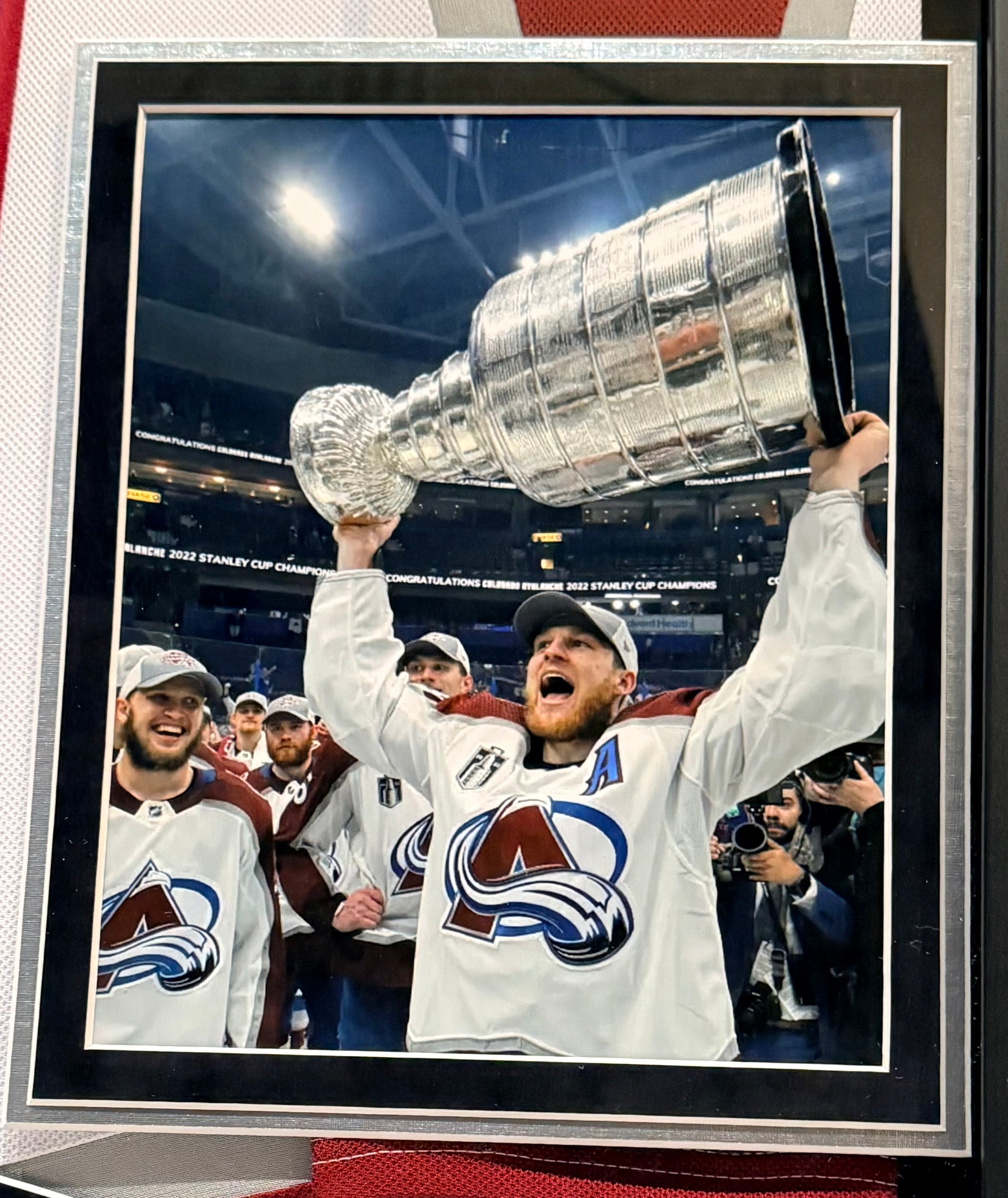 Nathan MacKinnon Autographed White Jersey – Colorado Avalanche | (2) 8x10 Photos & Deluxe Frame | Fanatics COA