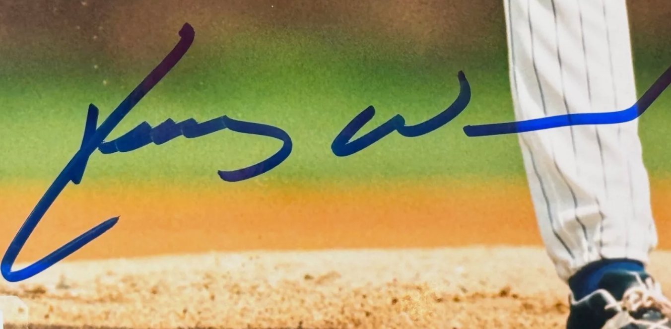 Kerry Wood Autographed 8x10 Photograph (JSA COA)